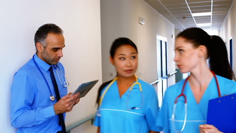 doctor using digital tablet