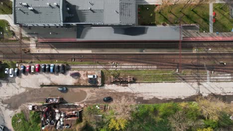 Aerial view of railway station with passengers