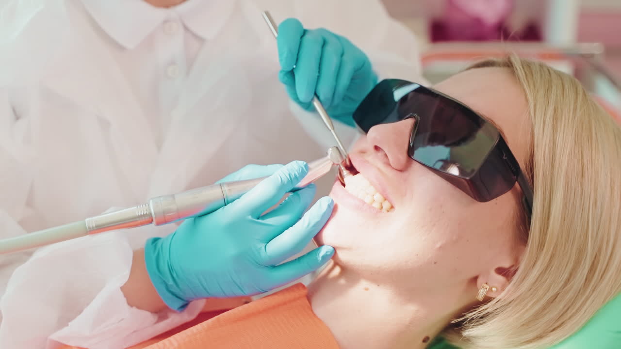 Dentist performing a dental procedure