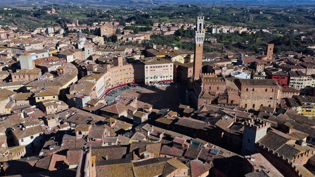 Historic aerial view of Piazza del Campo in Siena, Italy, showcasing medieval architecture