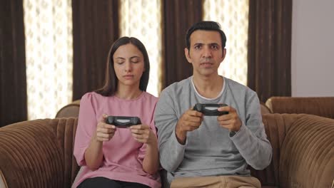 indian couple playing video games