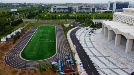 Aerial-view-of-Olympic-Center-football-field-in-Weihai,-China