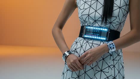 futuristic fashion statement: a model showcases a high-tech wearable device and stylish accessories set against a minimalistic background