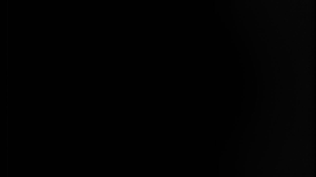 Explosions on black background 4k