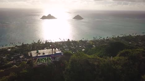 beautiful hawaii beach overlook hike with a couple of pillboxes at the very top