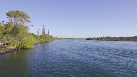 Flying-Close-to-the-Water-on-the-Tweed-River,-New-South-Wales,-Australia