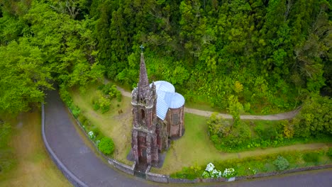 Church-in-middle-of-green-subtropical-forest-in-Sao-Miguel,-Azores-islands