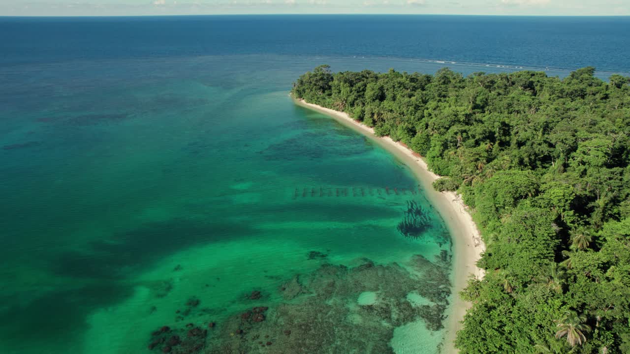 Drone forward view over the ocean in Cahuita National Park, Costa Rica