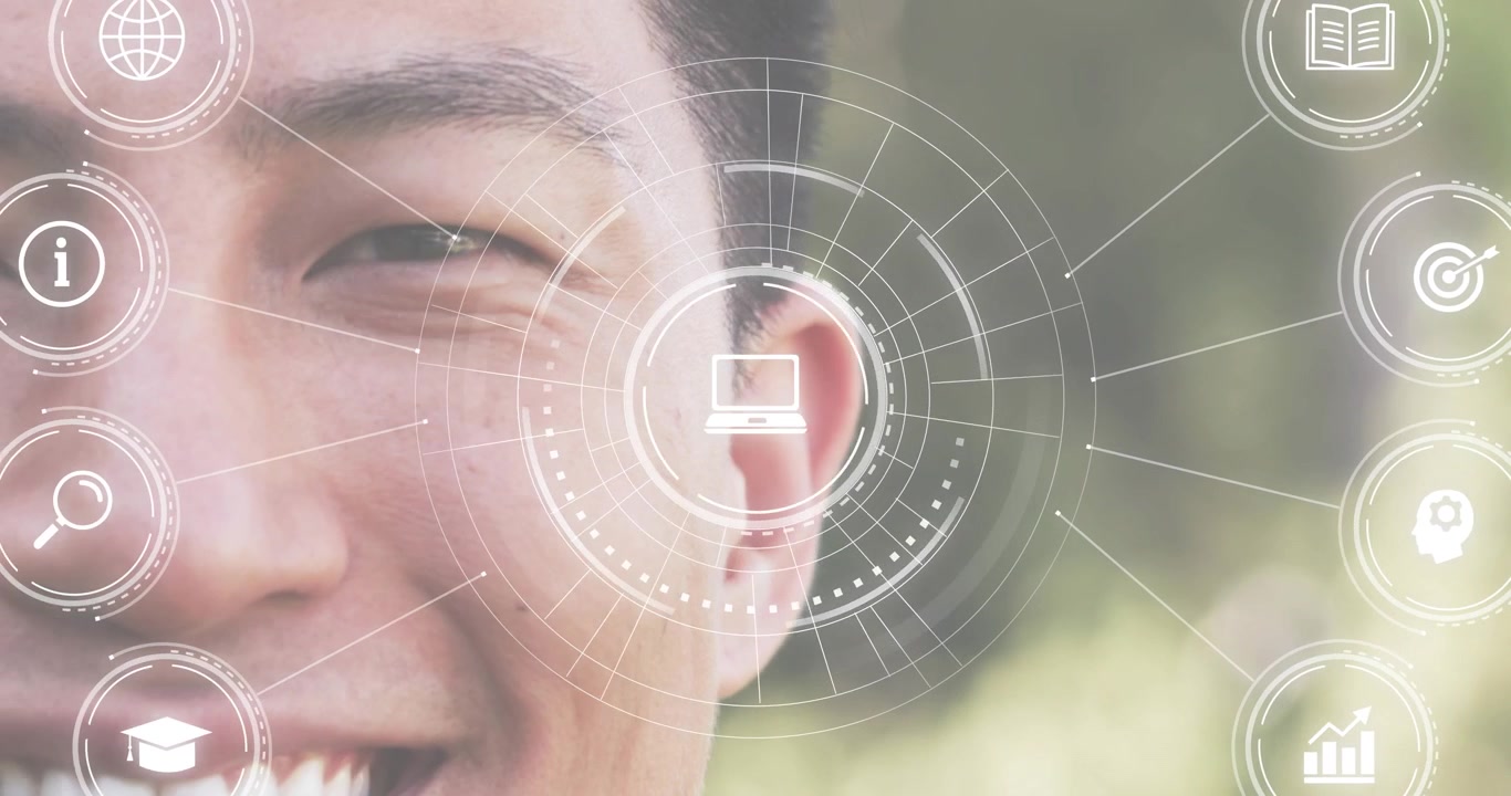 Close-up man's face starting HUD scanning and assembling technology icons around cheek for learning