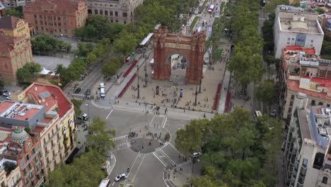 barcelona city downtown arc of triumph drone flying forward 4k