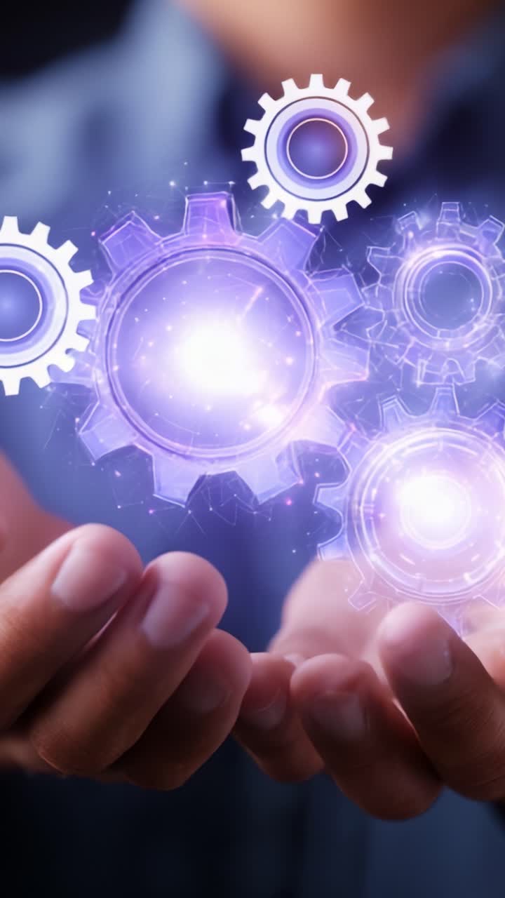 Interactive image displaying hands holding glowing gears, symbolizing innovation, technology, and the interconnectedness of machinery in modern society and industry