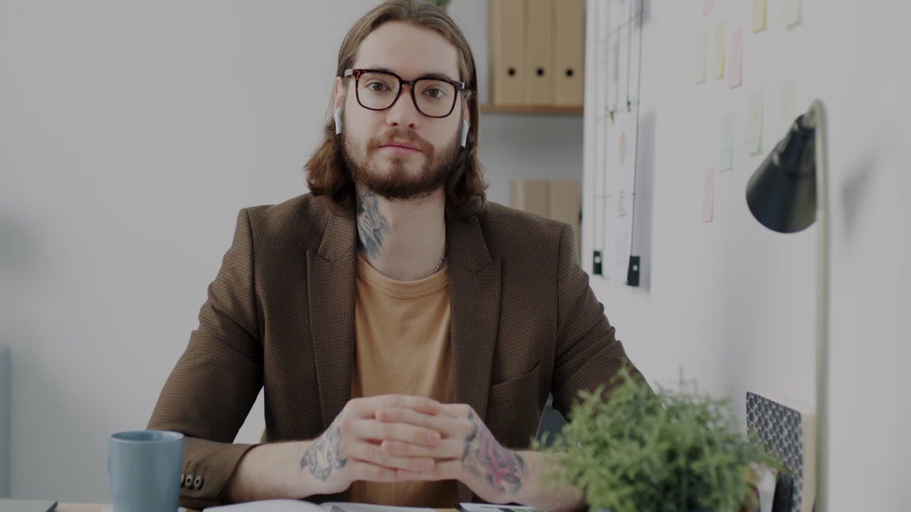 Businessman in Office During Video Call