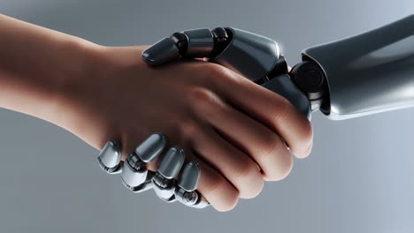 human and robot handshake representing ai collaboration