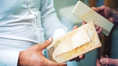 man recommendation marble. close up view of seller proposing marble to male client