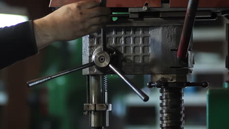 Steel factory staff worker Asian man work ironwork in a heavy industrial machine with safety engineer uniform