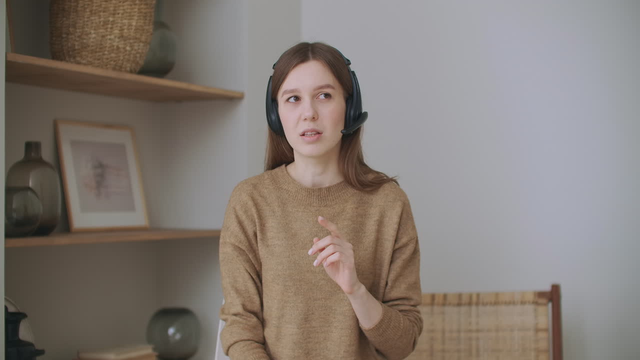 Woman look at web cameras listen webinar lecture participate conference call with male leader coach mentor speaking during virtual video chat online training webcast.