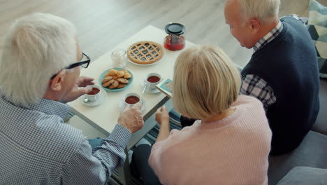 grandparents sharing memories of grandchild