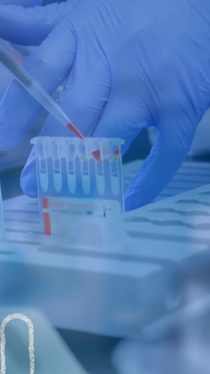 Scientist Pipetting Samples in Laboratory with COVID-19 Overlay