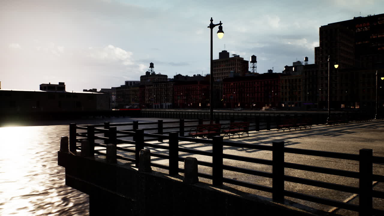 una vista del horizonte de la ciudad desde un muelle al atardecer