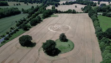 establishing aerial view towards warminster 2023 crop circle farmland alongside a36 highway