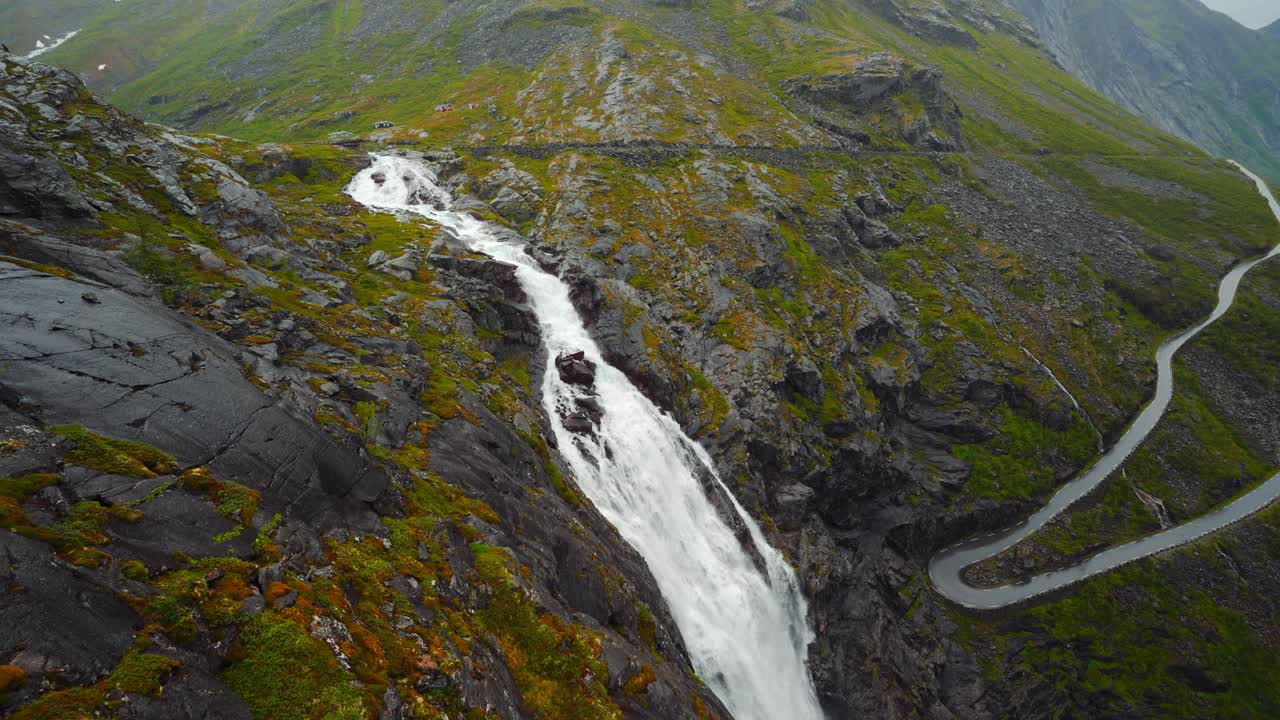 Stigfossen waterfall above famous Trollstigen serpentine road, Norway, Scandinavia. Scenic landscape nature