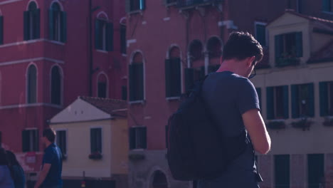 person walking in venice, italy