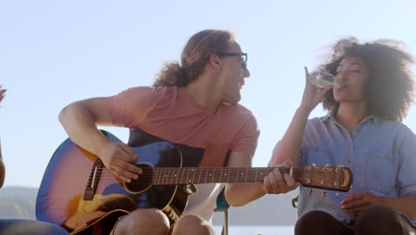 friends enjoying music and drinks