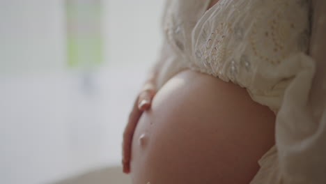 pregnant woman joyfully awaiting first child