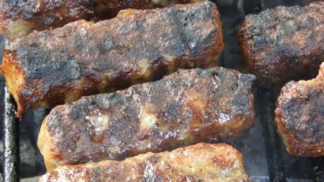 traditional food meat balls "mici" on grill