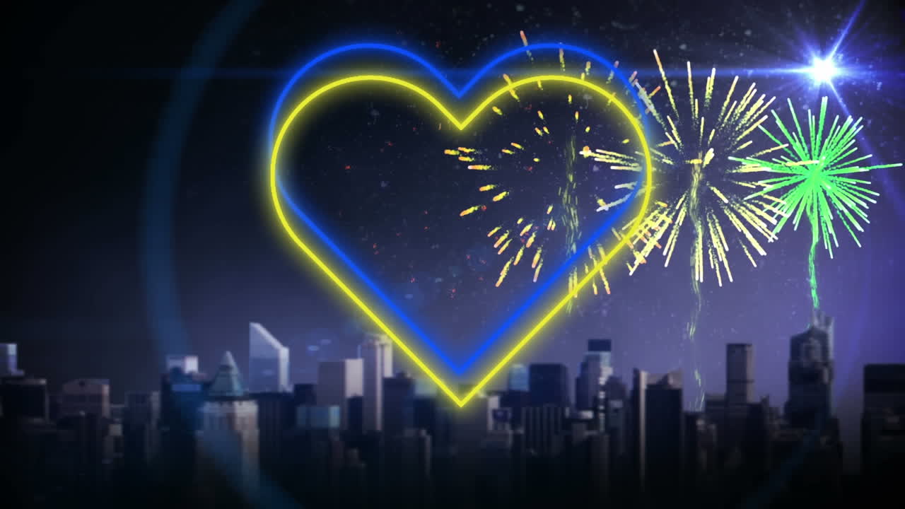 불꽃놀이와 도시 풍경 위에서  ⁇ 박이는 파란색과 노란색 네온 심장의 애니메이션