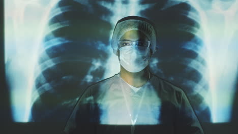 middle eastern doctor in mask posing on chest x-ray