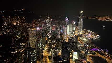 moving drone shot capturing tall skyscrapers of downtown city with a beautiful skyline in hong kong.
