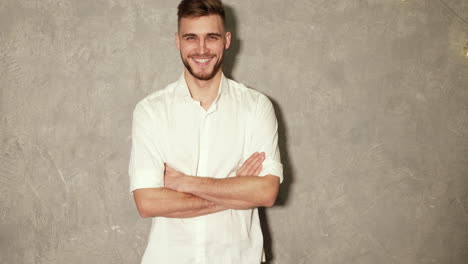 smiling man in white shirt