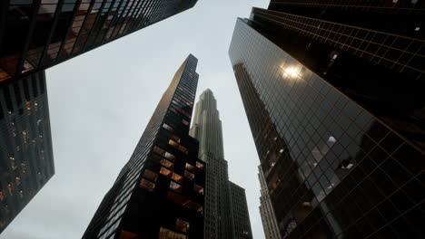 looking directly up at the skyline of the financial district