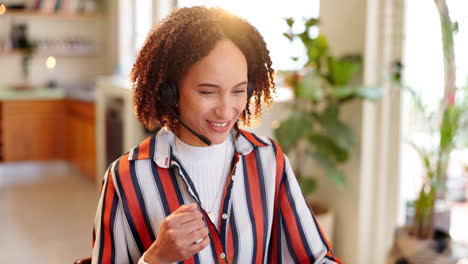 woman wearing headset in home office