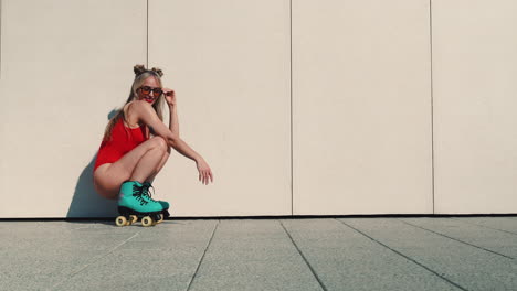 woman on roller skates in red swimsuit