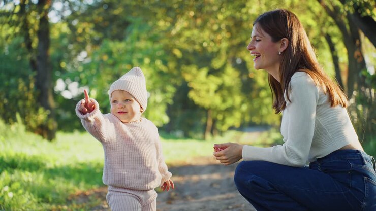 Mother and Toddler Daughter Enjoying a Day in the Park