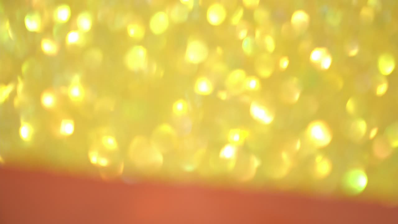 박이는 배경, 황금빛 빛의 흐릿한 질감, 노란색 금색 린과 함께 매이지 않는 질감