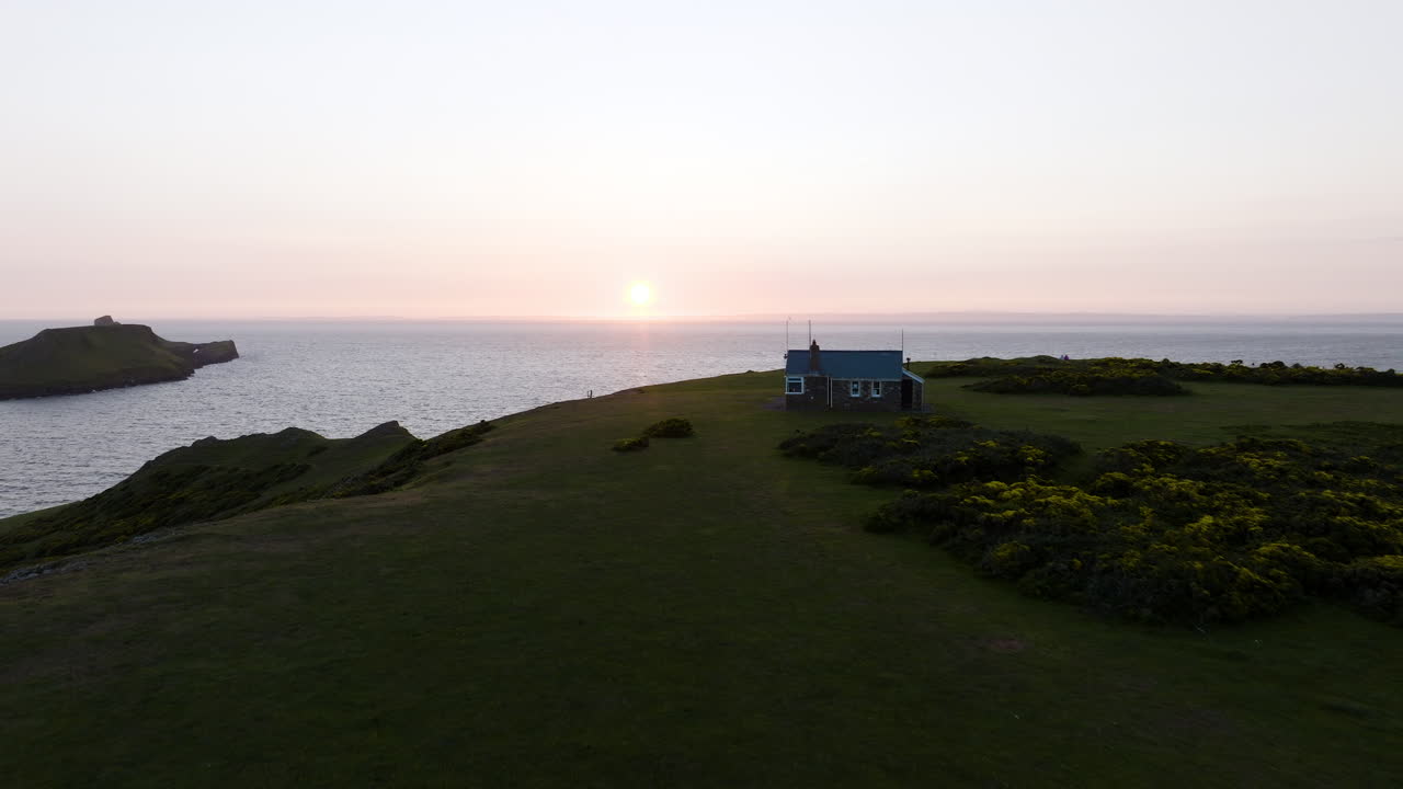 Coastal Sunset View with Small House