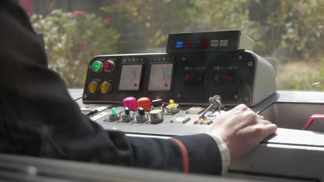 View-of-the-pilot-in-a-small-mountain-train-in-japan