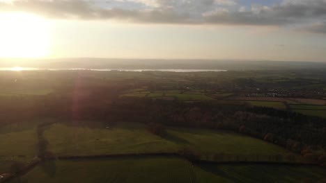 Golden Warm Sunset Light Over Woodbury Common. Aerial Slow Dolly Forward
