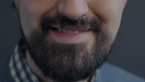 man with beard smiling