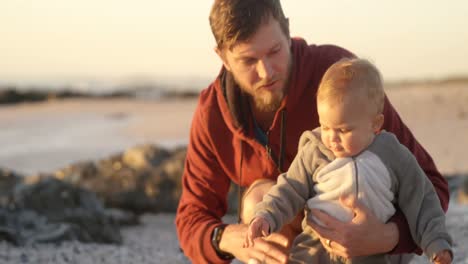 Father-and-baby-boy-playing-with-their-dog-4k