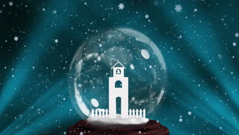 animación del globo de nieve de navidad y la nieve cayendo sobre un fondo azul