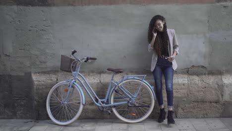 young woman with a bicycle