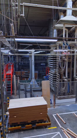 wood timber construction material. wooden boards in a warehouse of building materials vertical video