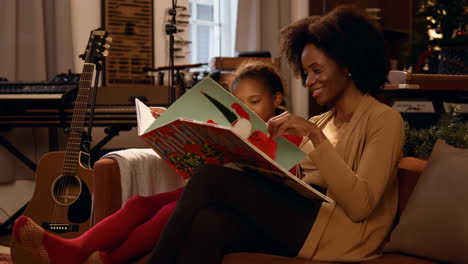 mother and daughter reading together