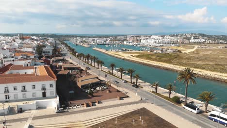 view of bensafrim river and harbour in lagos, algarve, portugal - aerial low angle panoramic shot