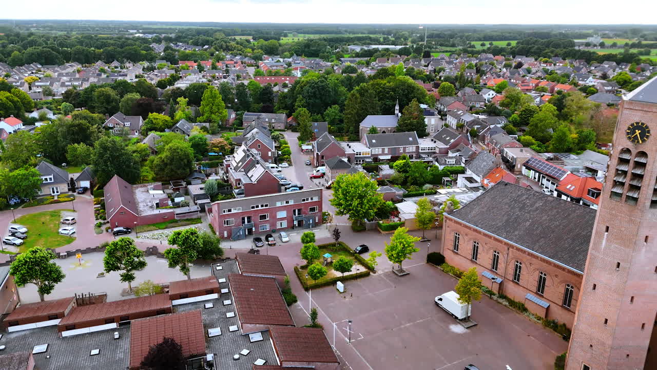 Summer suburban scenic view. Aerial view reveals a serene suburban area with green landscapes and well-kept homes in summer