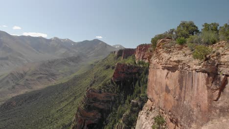 aerial flight along canyon rim at porcupine rim, castle valley, moab